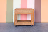 Old Florida Rattan Wrapped Nightstand on Castors