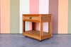 Old Florida Rattan Wrapped Nightstand on Castors