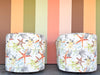 Pair of Starfish Upholstered Swivel Chairs
