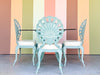 Palm Beach Chic Grotto Shell Back Outdoor Dining Set