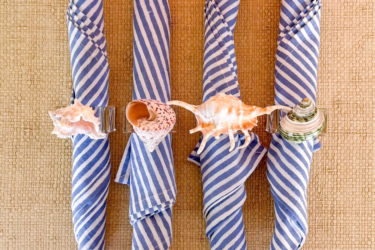 Set of Four Lucite Shell Napkin Rings