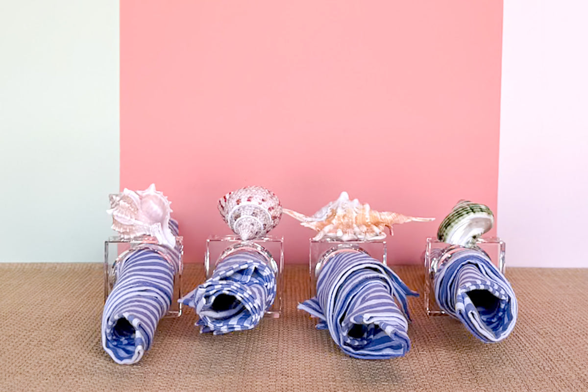 Set of Four Lucite Shell Napkin Rings
