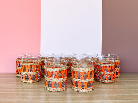 Set of Eleven Orange Raffia Glassware