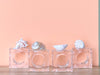 Set of Four Shell Lucite Napkin Rings