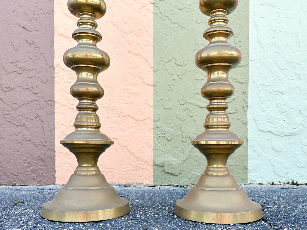 Lot - Pair of brass push up candlesticks with diamond, beehive and
