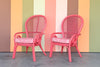 Pair of Hot Pink Whimsical Rattan Chairs