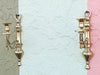 Pair of Brass Tassel Wall Sconces