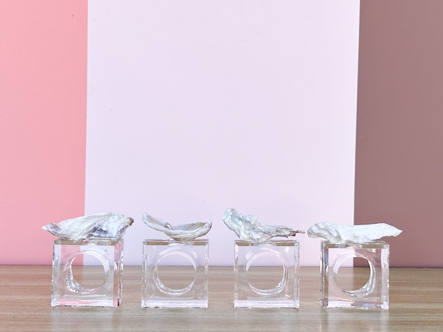 Set of Four Oyster Pearl Lucite Napkin Rings