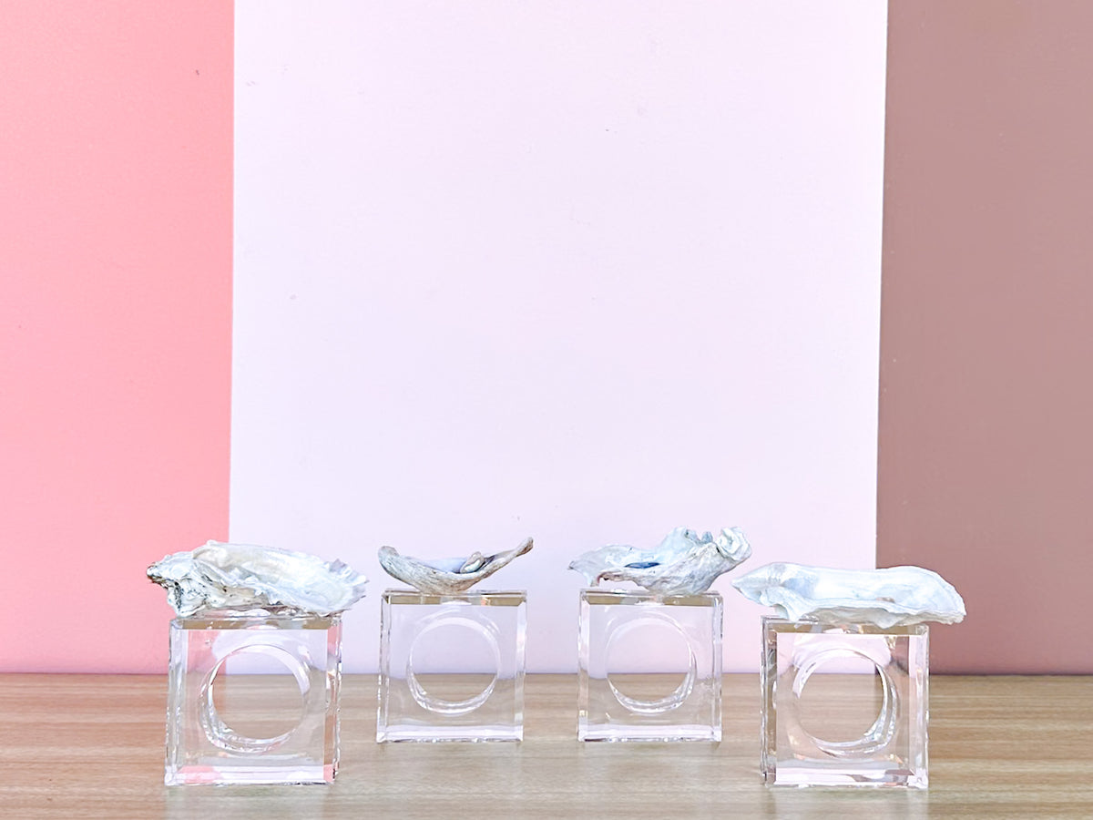 Set of Four Oyster Pearl Lucite Napkin Rings