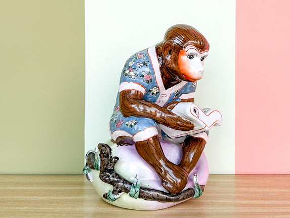 Porcelain Reading Monkey Figurine