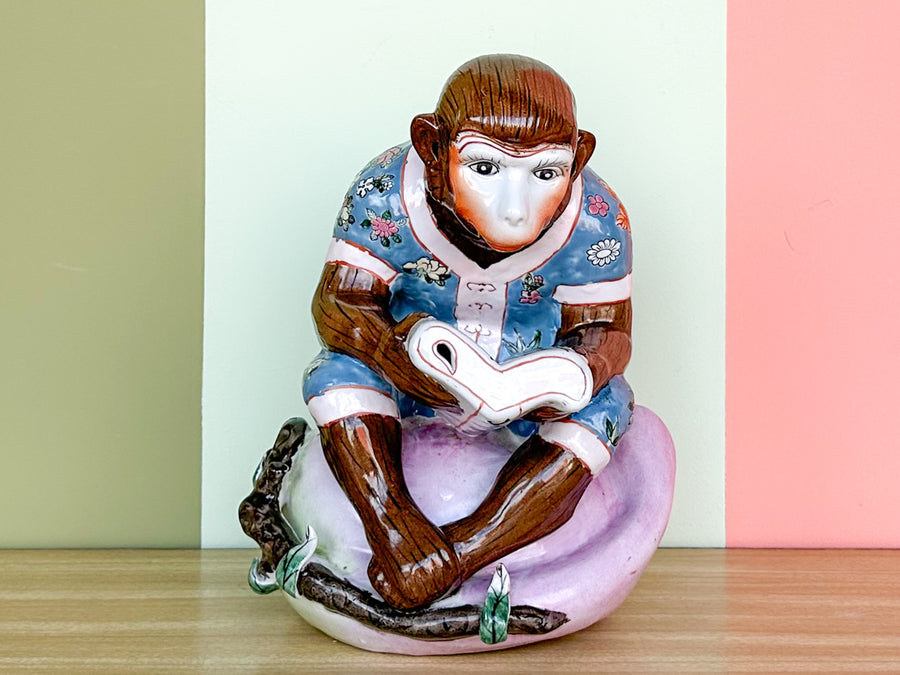 Porcelain Reading Monkey Figurine