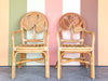 Pair of Island Style Palm Leaf Rattan Arm Chairs