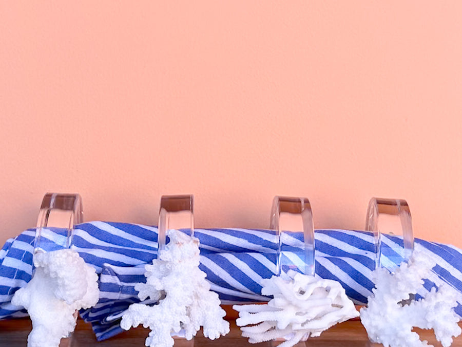Set of Four Coral Lucite Napkin Rings