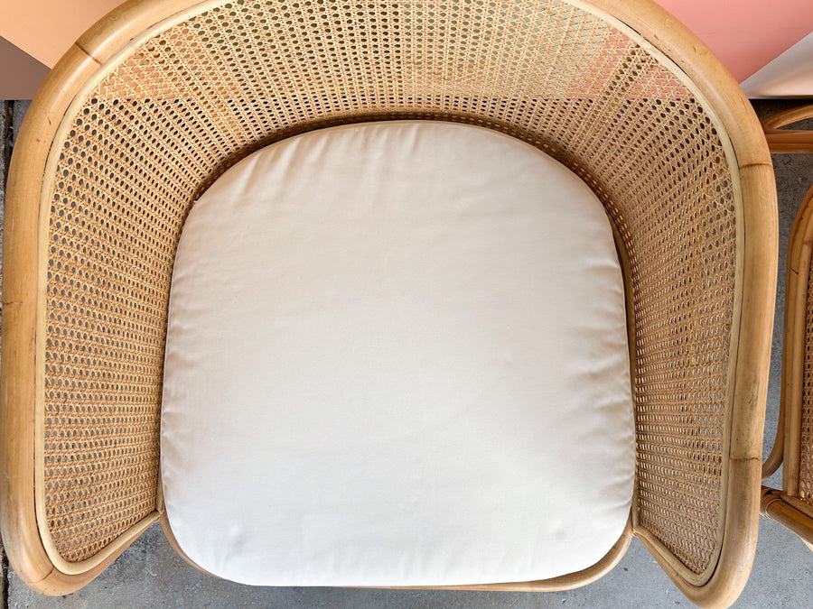 Pair of Rattan and Cane Barrel Chairs