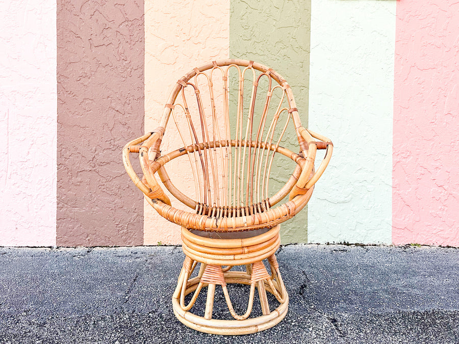 Old Florida Rattan Swivel Sunburst Chair