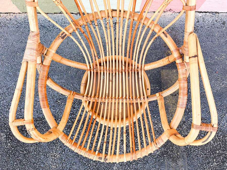 Old Florida Rattan Swivel Sunburst Chair