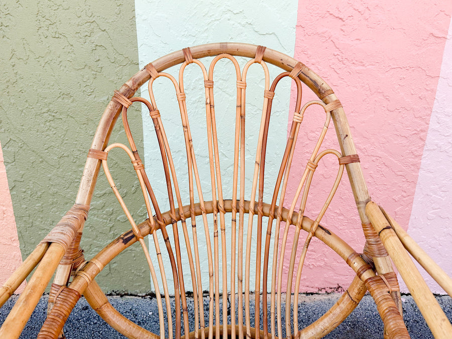 Old Florida Rattan Swivel Sunburst Chair