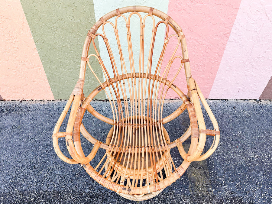 Old Florida Rattan Swivel Sunburst Chair