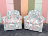 Pair of Tropical Upholstered Swivel Chairs