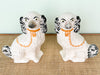 Pair of Black and White Dog Figurines