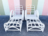 Pair of White Rattan Pretzel Chairs and Ottomans