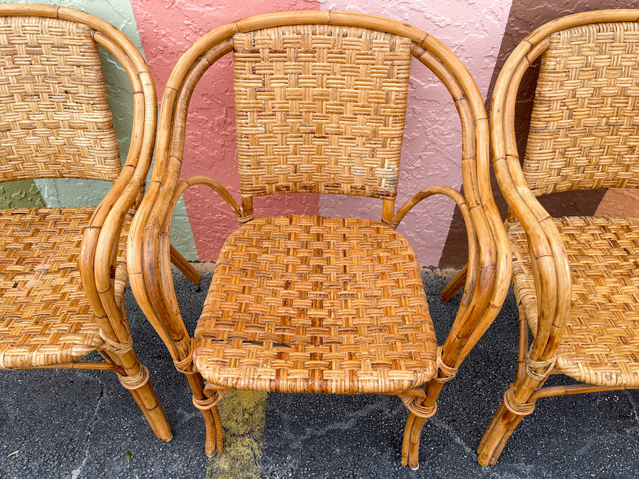 Pair of Woven Rattan Arm Chairs