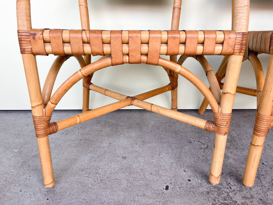 Pair of Leather and Rattan Arm Chairs
