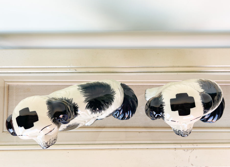 Pair of Black and White Dog Figurines