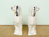 Pair of Black and White Dog Figurines