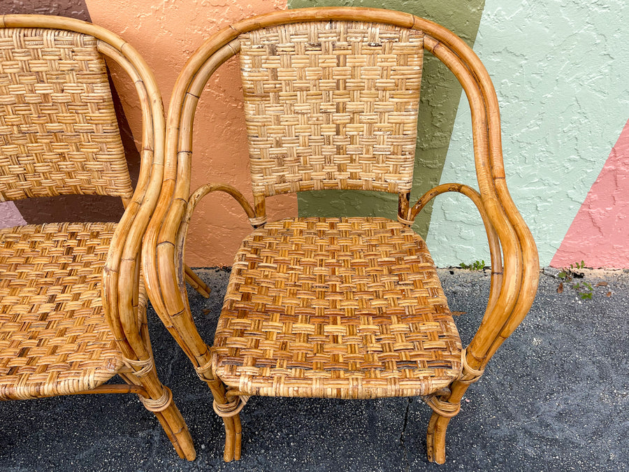 Pair of Woven Rattan Arm Chairs