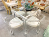 Set of Four Lucite Game Chairs on Casters