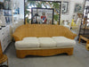 Benchcraft Island Style Woven Rattan Sofa