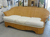 Benchcraft Island Style Woven Rattan Sofa