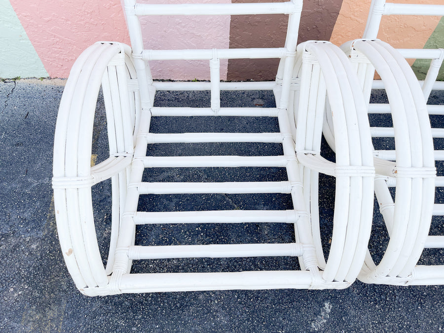 Pair of White Rattan Pretzel Chairs and Ottomans